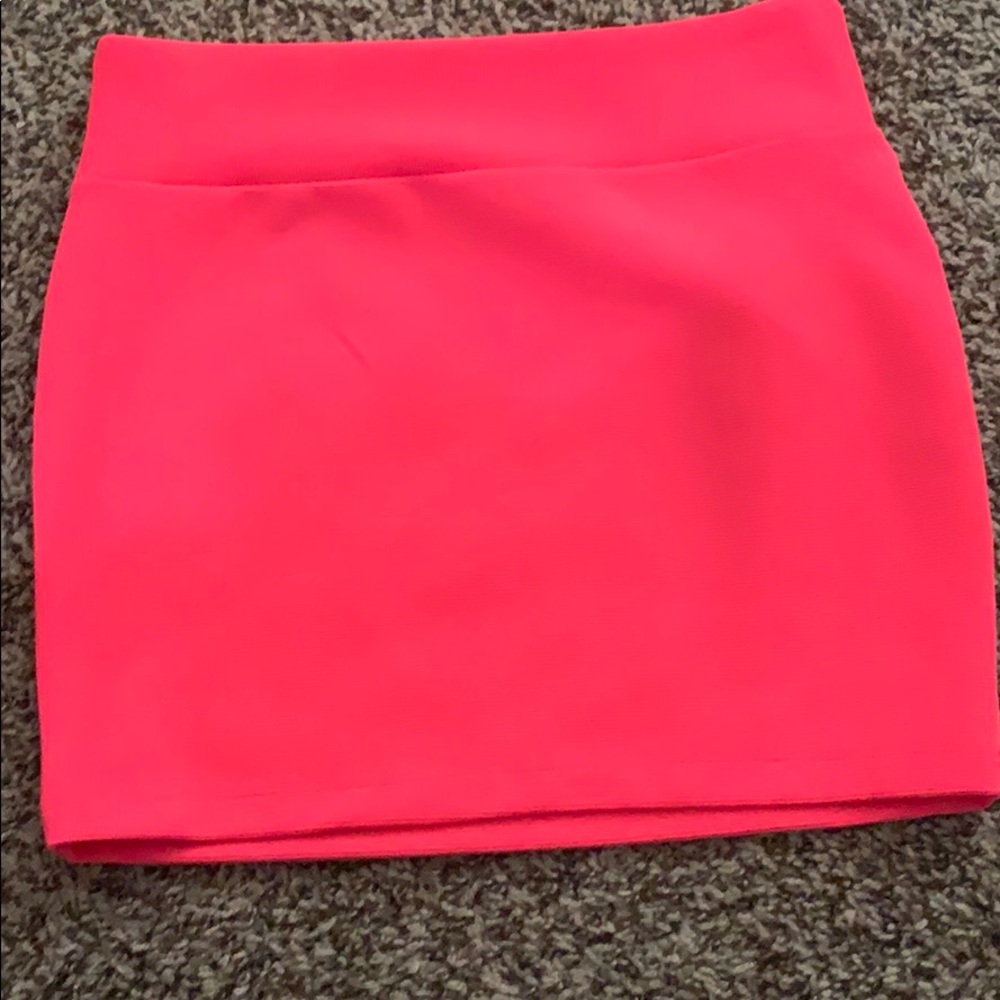 Neon pink mini skirt